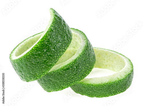Lime fruit twist isolated on a white background. Lime peel. photo