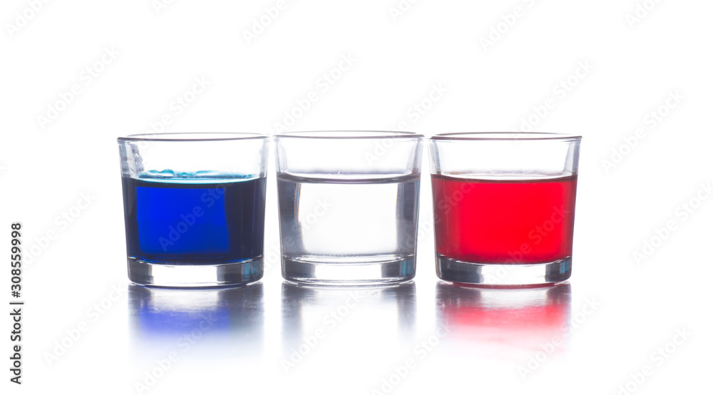 several shot glasses with different drinks, which combined represent the flag of a country several shot glasses with different drinks, which combined represent the flag of a country