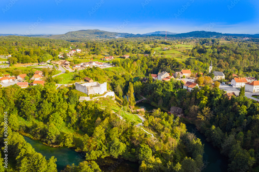 Croatia, beautiful green countryside landscape, fortress and town of Slunj