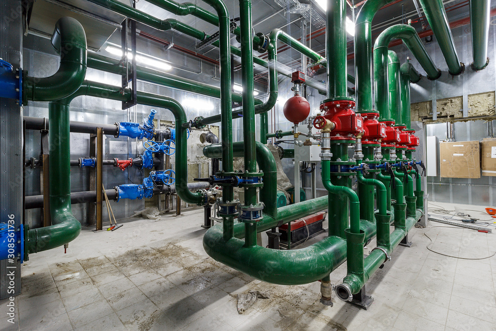 pumping station under construction. pipes of central heating system and