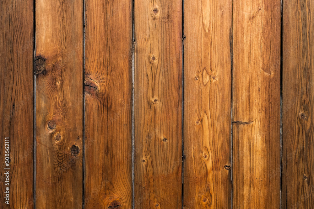 Wood planks surface with vertically pattern as textured and background. Wood planks surface with vertically pattern as textured and background.
