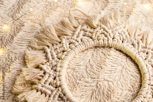 Handmade macrame  circle decoration on artificial fur