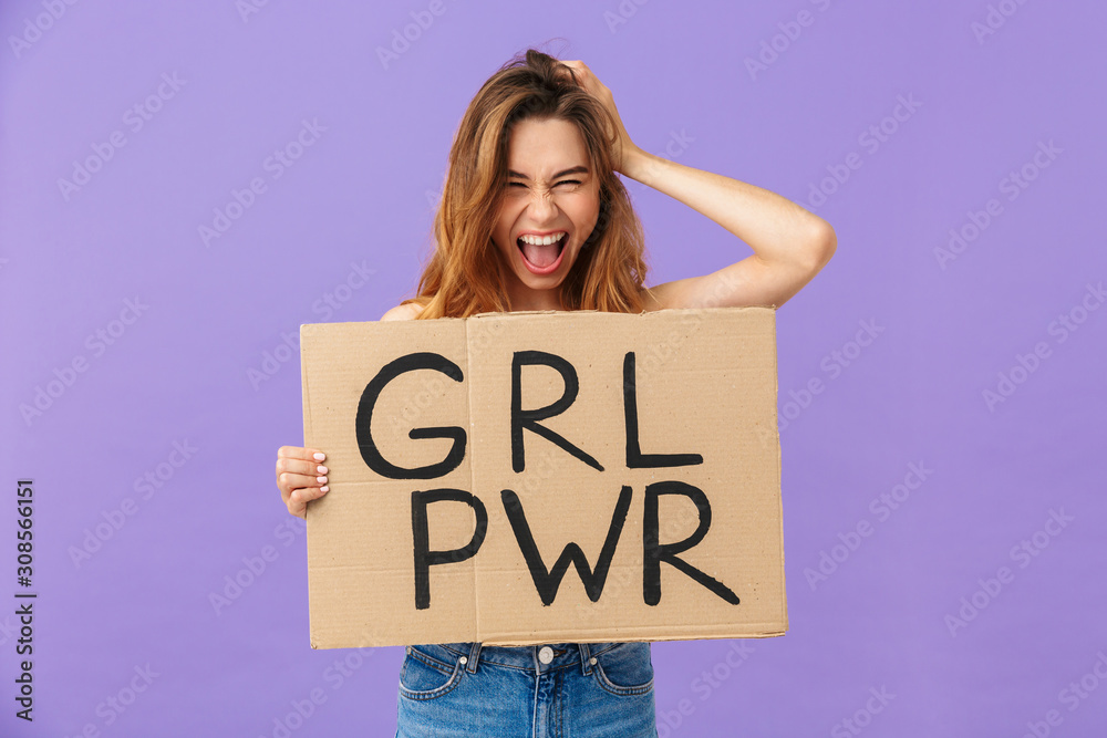 Cheerful topless woman showing banner with girl power Cheerful topless woman showing banner with girl power