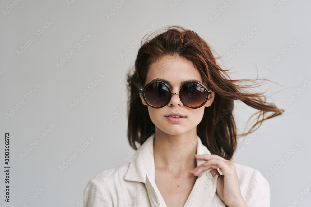 portrait of young woman in sunglasses portrait of young woman in sunglasses