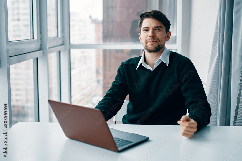 businessman working on laptop in office businessman working on laptop in office