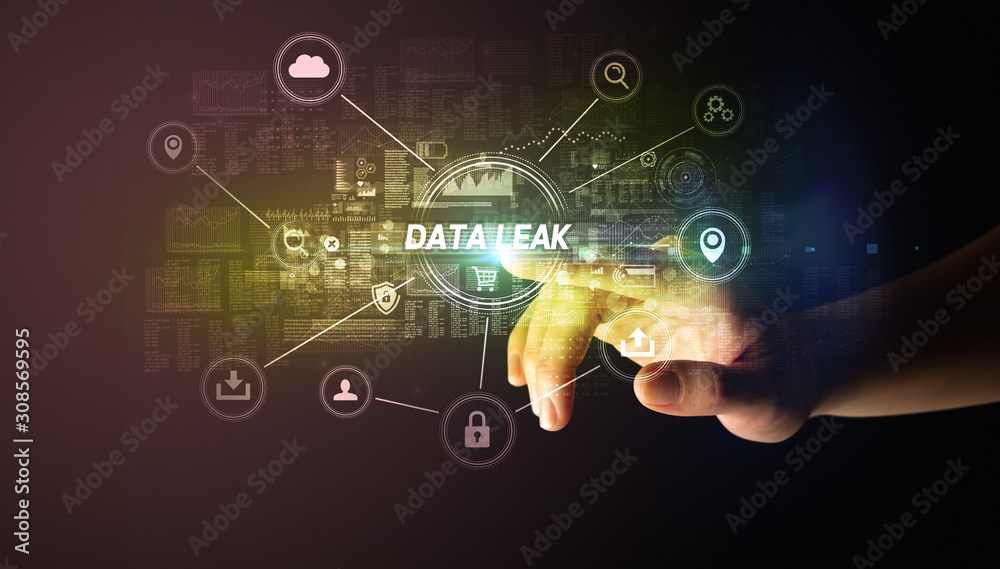Hand touching DATA LEAK inscription, Cybersecurity concept Hand touching DATA LEAK inscription, Cybersecurity concept