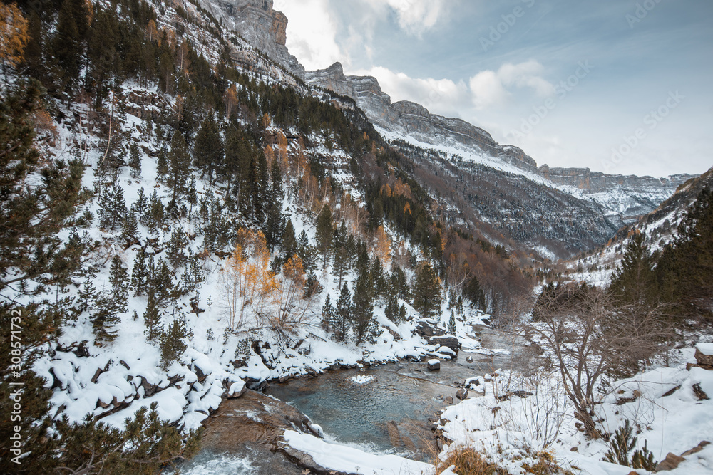 Fototapeta premium Ordesa National Valley in snowy autumn, located in Pyrenees Spain