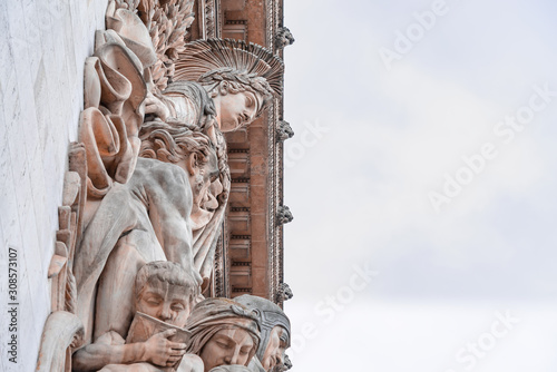 Photography Beautiful view on details of the Arc de Triomphe, Paris, France.