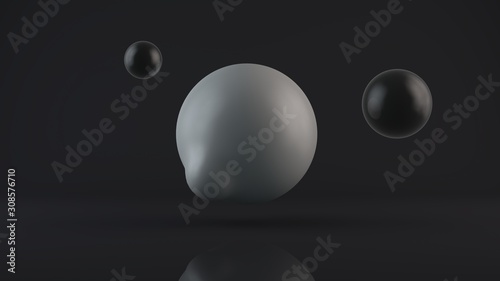 3D rendering of a large glowing white sphere with an elongated, deformed edge and two black balls placed side by side. A combination of a deformed body and a perfect, black and white object.