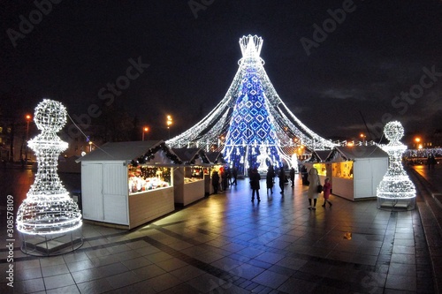 Photography Beautiful Christmas tree decorated with white and blue lights for Christmas 2019