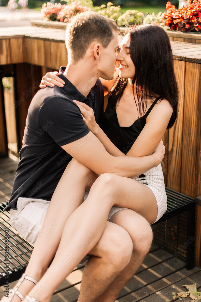 Loving couple hugging in the street. Loving couple hugging in the street.