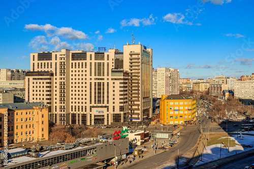 Panoramic top view of business center of Moscow (office, international). Commercial real estate. Sunny winter snowy day. Bolotny or Balchug Island near Kremlin and Vodootvodny Canal bridge photo