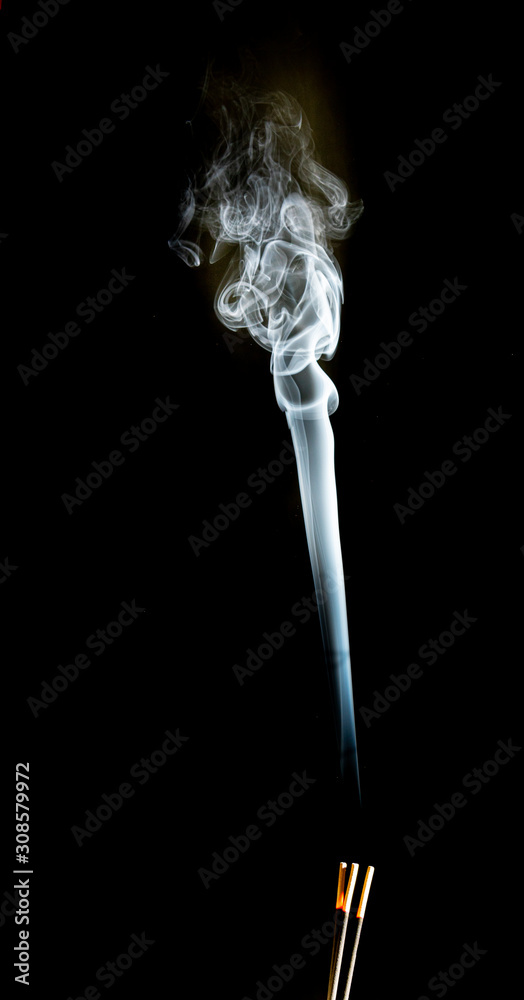 Unique white smoke trails on a black background Unique white smoke trails on a black background