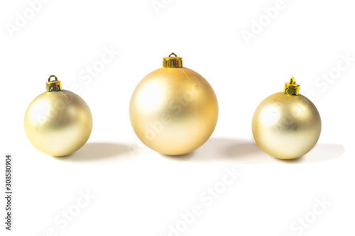 Golden christmas bals isolated on white background