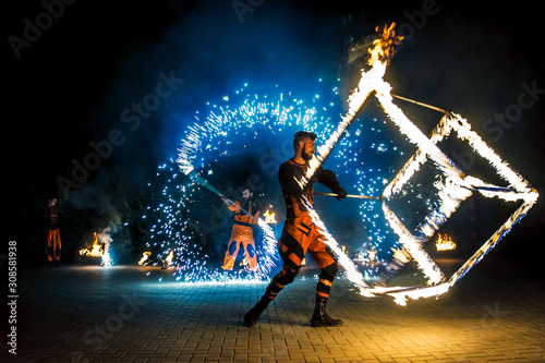 Εκτύπωση καμβά Fire show, dancing with flame, male master fakir with fire works, performance ou