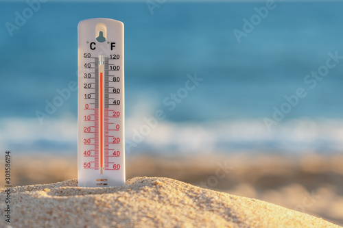 The thermometer shows the temperature on the beach in summer, high. Portugal. photo