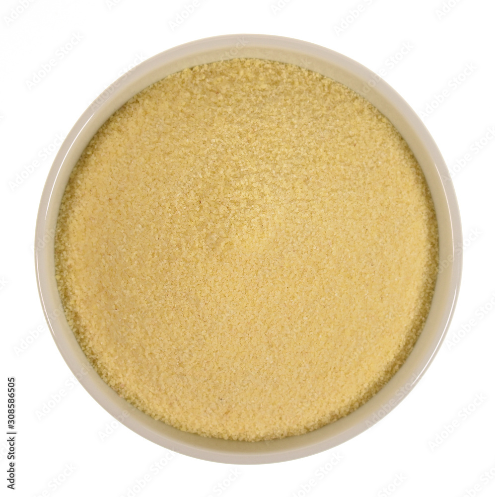 Semolina in a bowl isolated on white Semolina in a bowl isolated on white