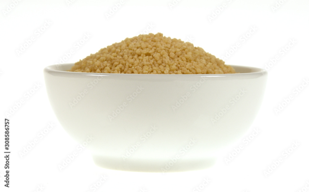 Couscous in bowl isolated on white Couscous in bowl isolated on white