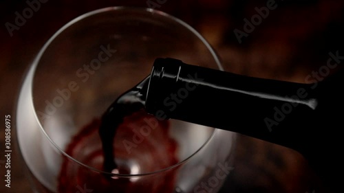 Red Wine Being Poured in Slow Motion