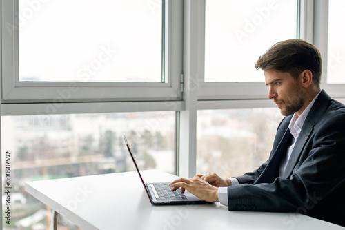 businessman working on laptop in office