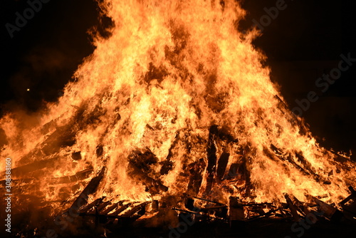 Big Bonfire by Night with Orange Glowing Flames