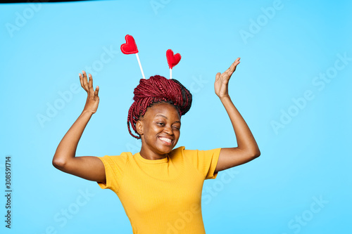 young man with open arms raised in the air photo