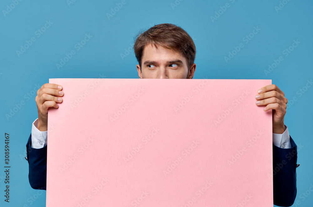 man holding white board man holding white board