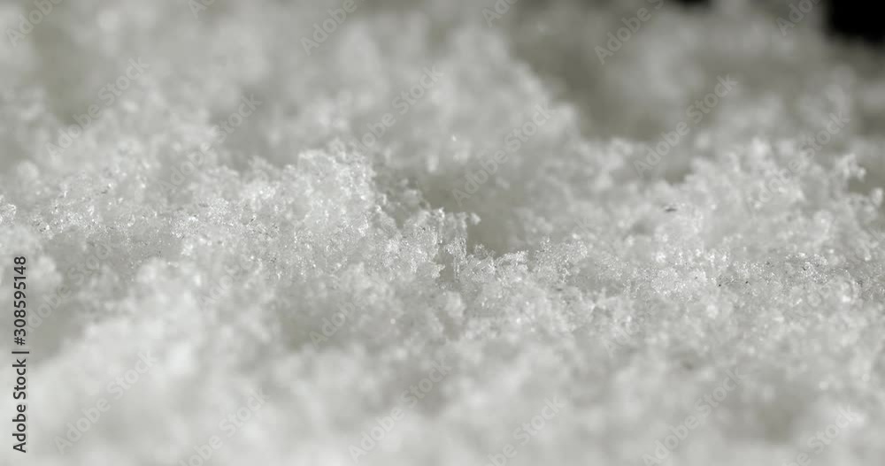 Snow accumulating on a windowpane, falling snowflakes closeup, 4k 60fps footage Snow accumulating on a windowpane, falling snowflakes closeup, 4k 60fps footage