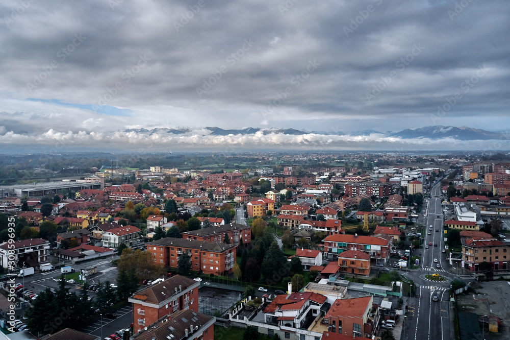 aerial view of torino Turin in autumn with the mountains and clouds at the horizon