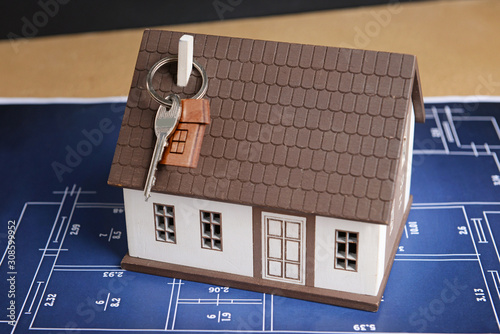 Model of house with key and...