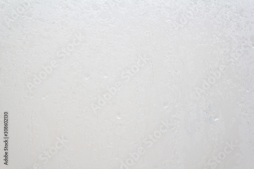 Shower screen with drops on a light background