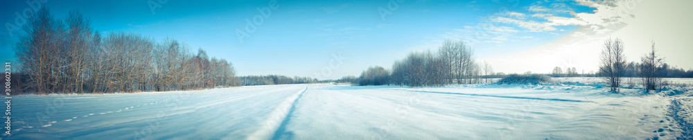 Beautiful winter landscape panorama. Sunset and morning in the cold. New Year's, Christmas stock photo. Snow-covered Siberian species