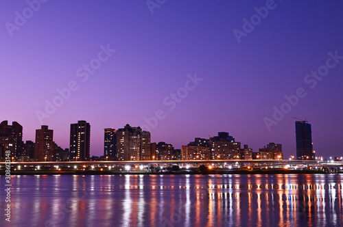  New Taipei City at night with reflection in water © lcc54613