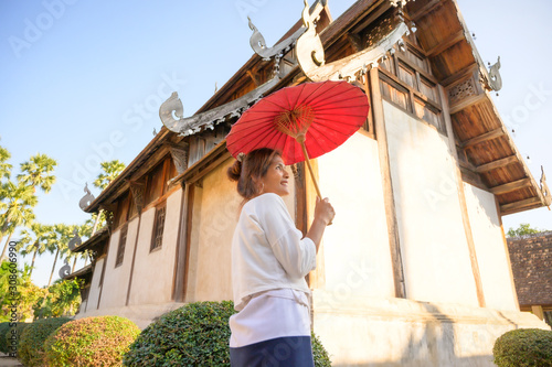 Thai woman with Lanna style background photo