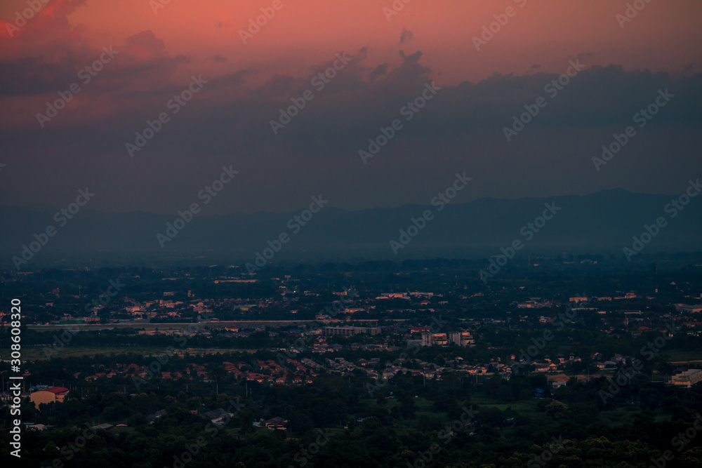 Blurry background Of the natural, high angle view From the viewpoint, you can see the colorful sky and see the houses surrounded.