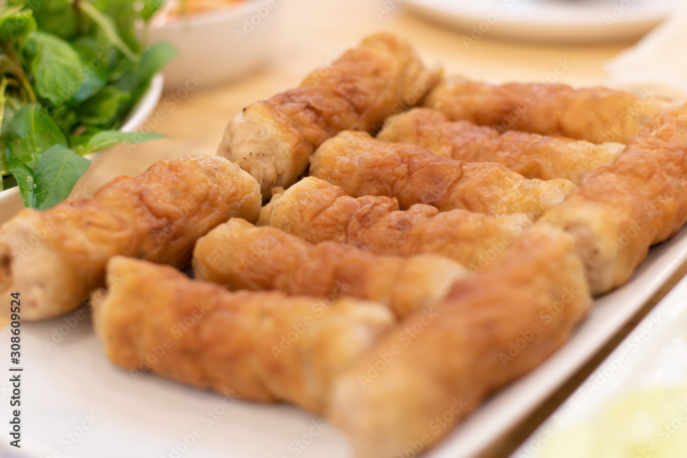 Vietnamese Meatball Wraps or Pork Cubes  Arranged on the plate.