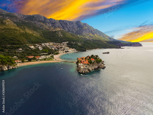 Beautiful sunset over ulcinj is town on coast of Montenegro. Aerial view on Ada Bojana Island and old Ulcinj Castle.  photo