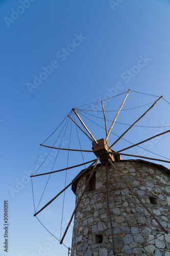 Windmill in front of blue sky,  photo