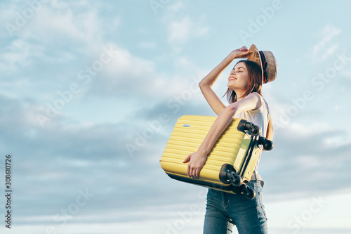 young tourist with backpack and map