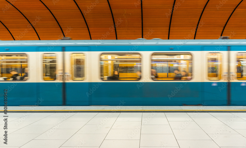 Naklejka premium Munich u-bahn subway station with futuristic design and orange vibrant colors
