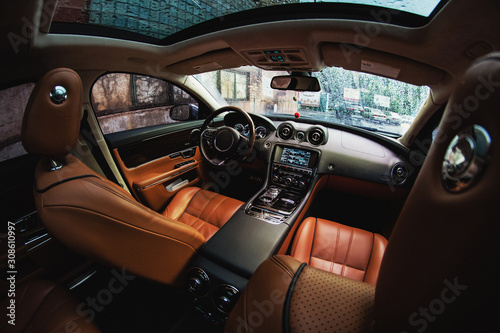 Modern car luxury interior with leather seats and modern electronics © Aleksander