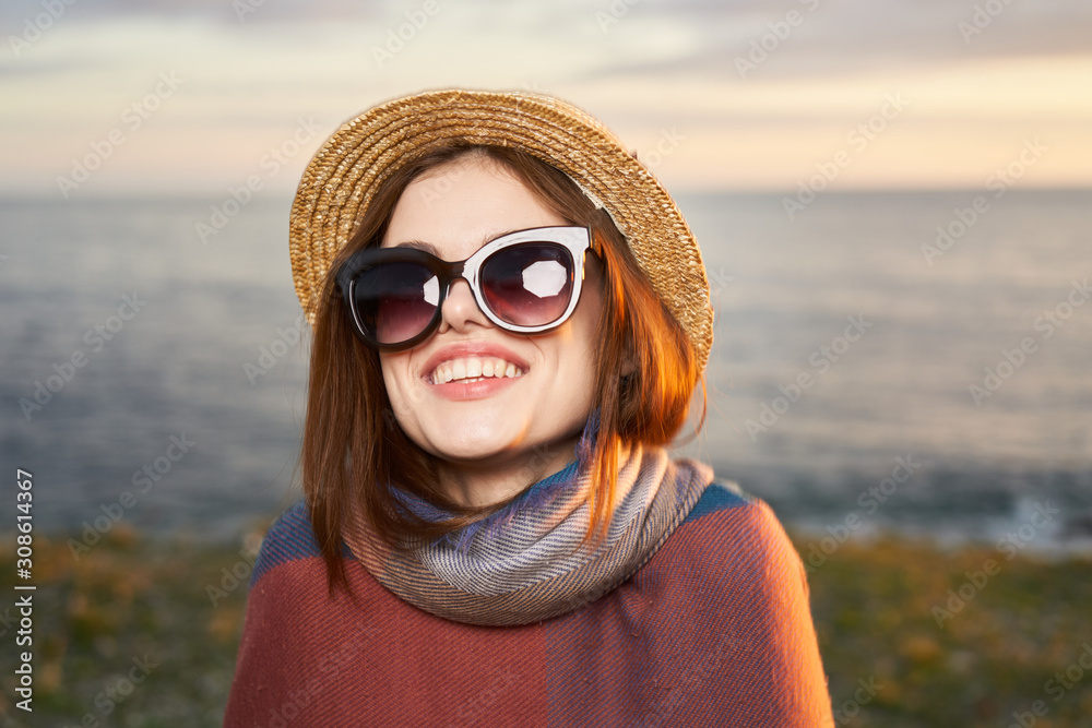 portrait of a girl in sunglasses on the beach portrait of a girl in sunglasses on the beach