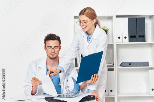 doctor with patient in office