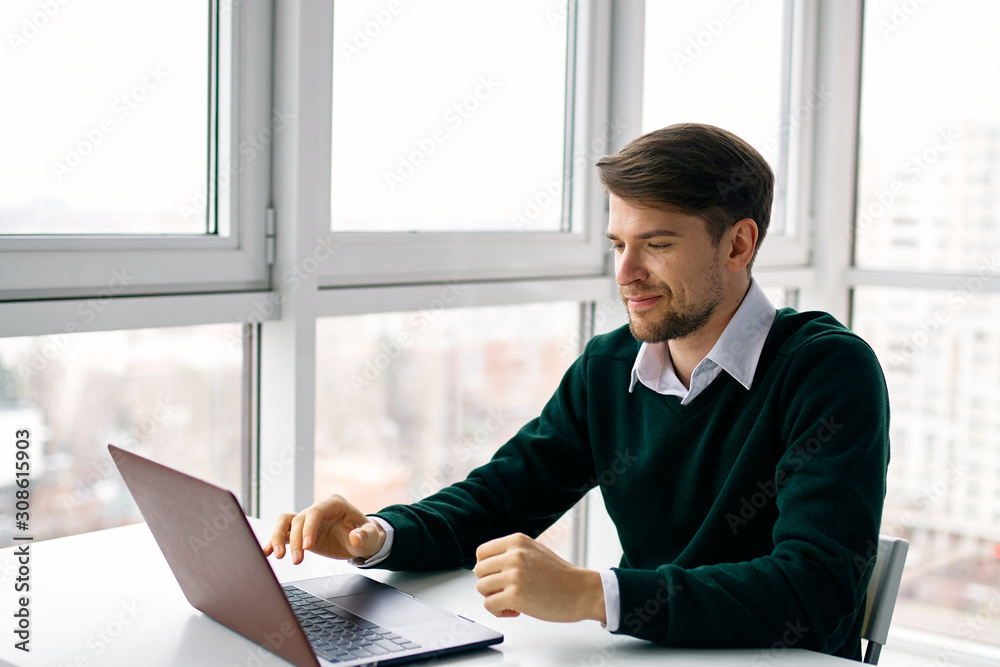 businessman working on laptop in office businessman working on laptop in office