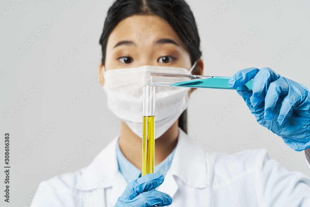 scientist in laboratory with test tubes scientist in laboratory with test tubes