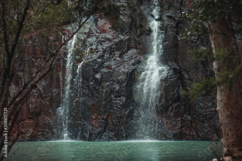 Fototapeta Naklejka Na Ścianę i Meble -  Waterfall scene with crisp blue water, Cedar Creek Falls, Queensland Australia