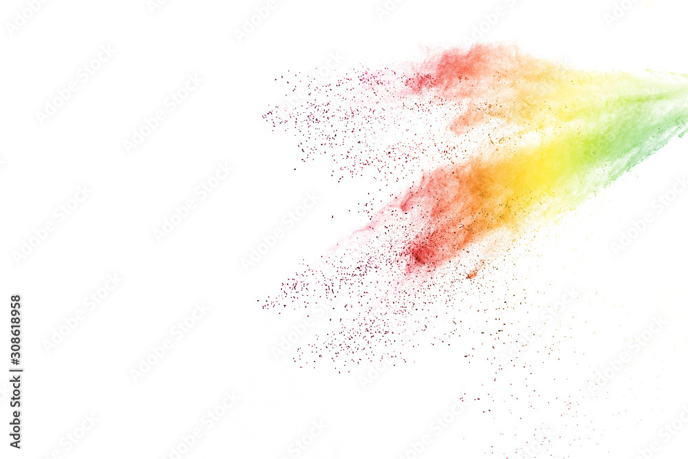 Obraz premium Freeze motion of colorful color powder exploding on white background. Paint Holi.
