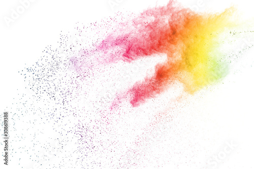 Freeze motion of colorful color powder exploding on white background. Paint Holi.