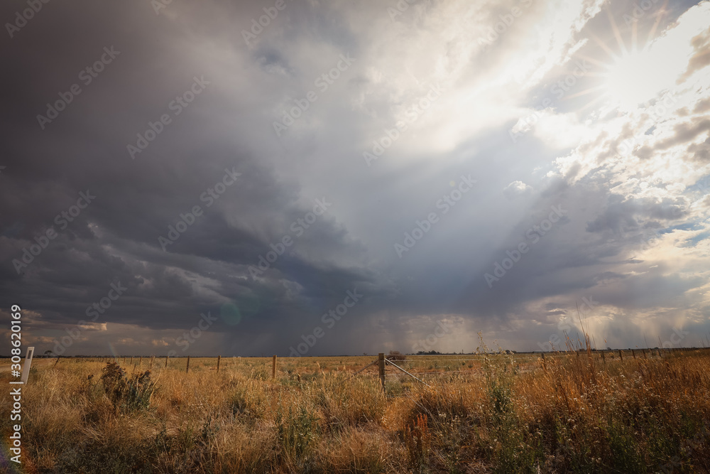 Stormy skies over rural country farmland 