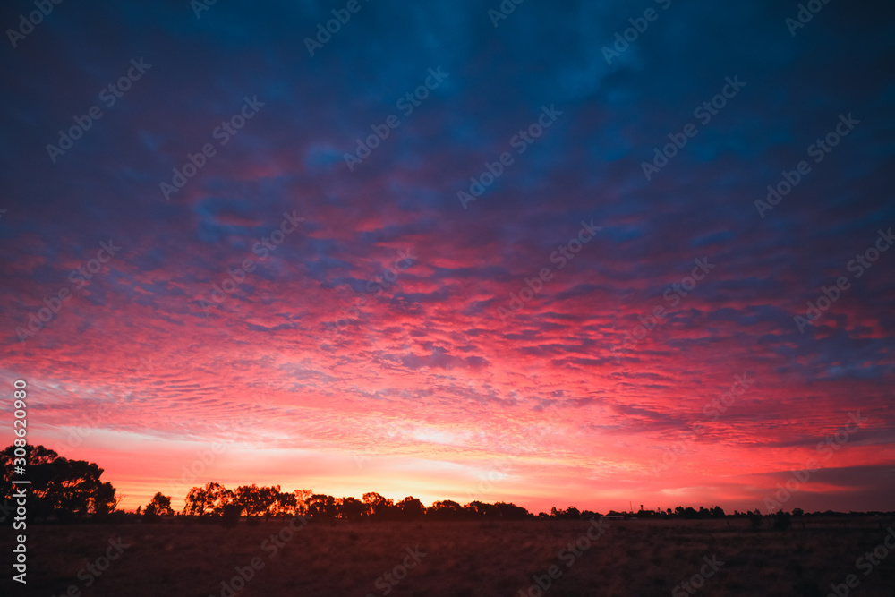 Vibrant pink and purple sunset sky in Central Victoria, Australia